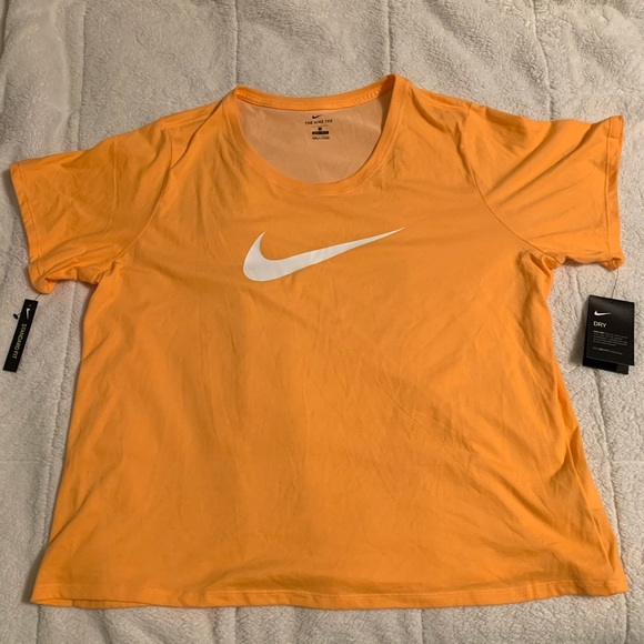 light orange nike shirt